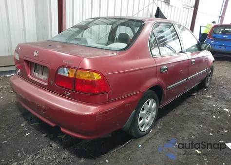 1999 Honda Civic Lx z USA, uszkodzony, nr VIN 1HGEJ6676XL034402